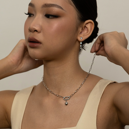 Model wearing the loved pendant with link necklace