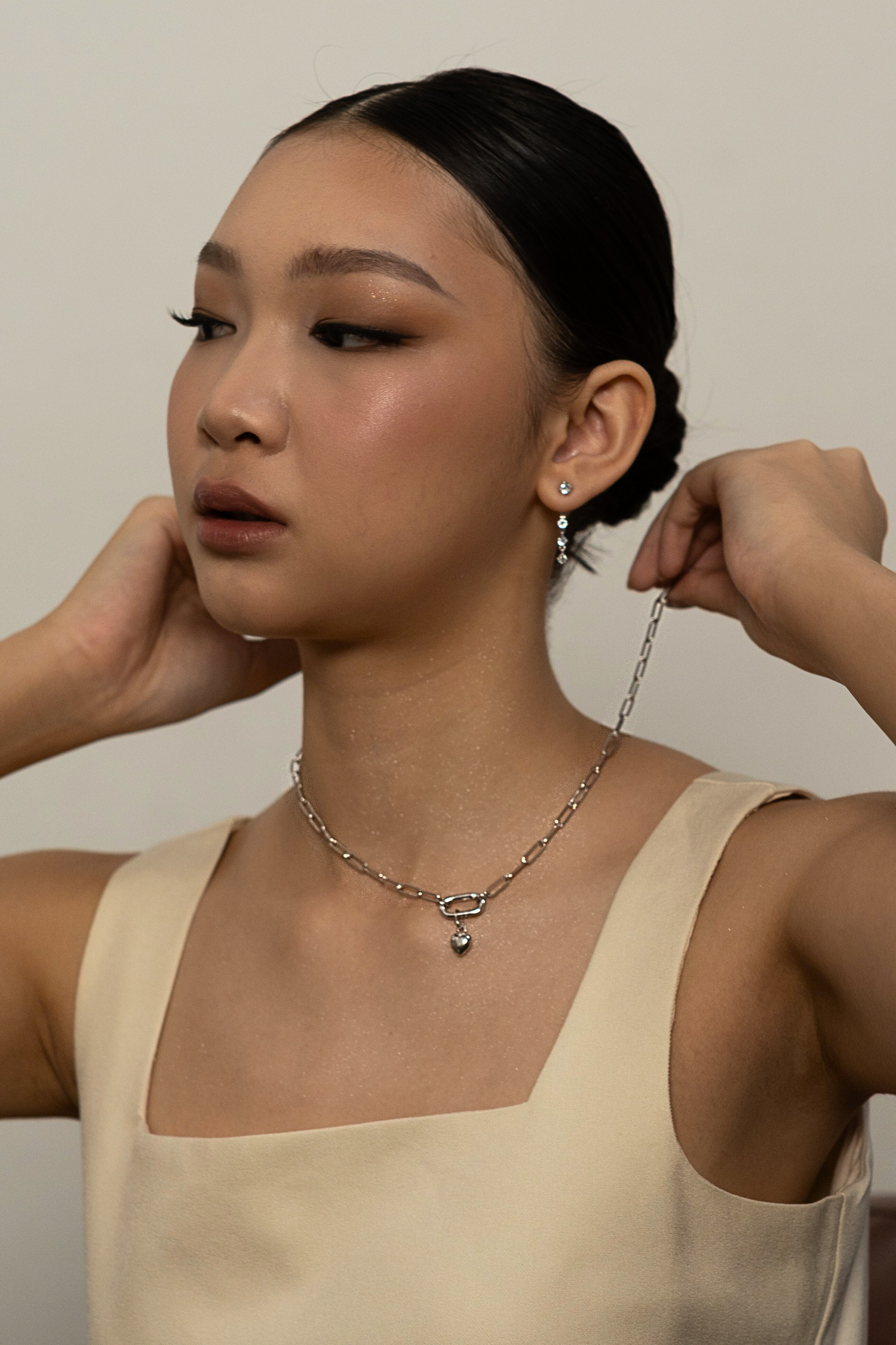 Model wearing the loved pendant with link necklace